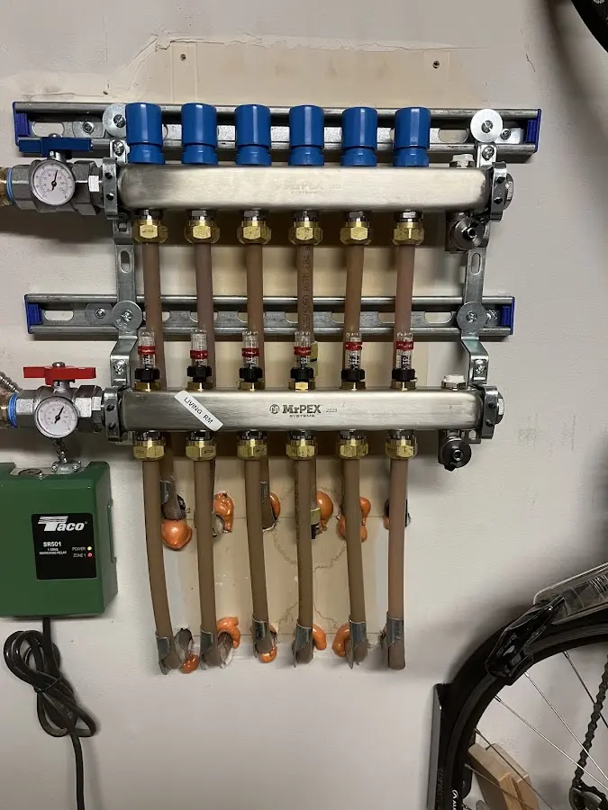 Plumber performing Sink Repair at a residential property in Woodmore